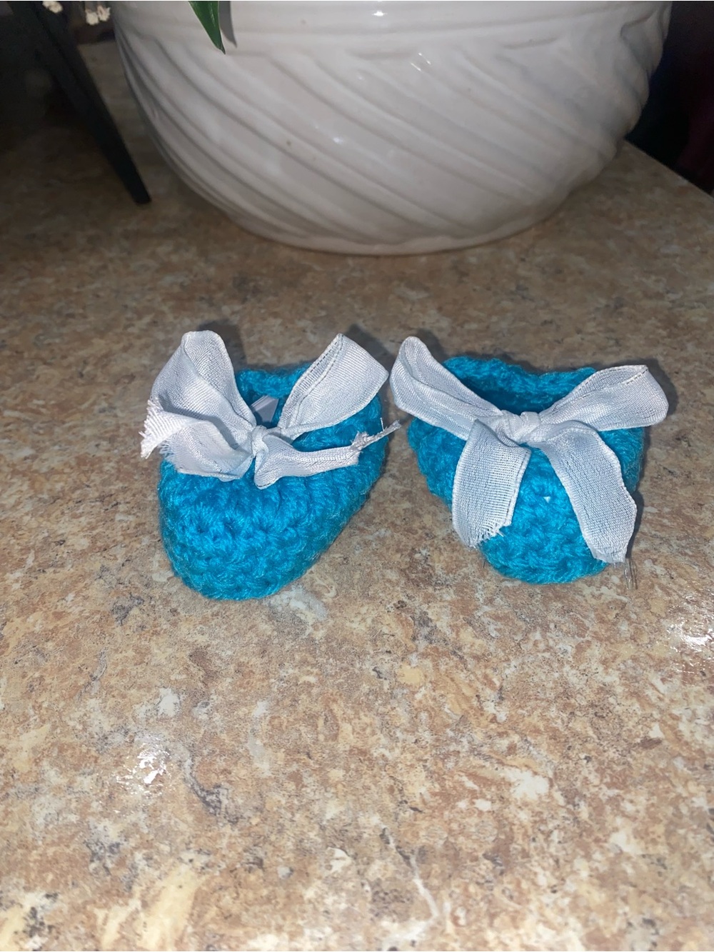 Crocheted Turquoise Baby Booties with a White Ribbon Bow Accent - Picture 4 of 4